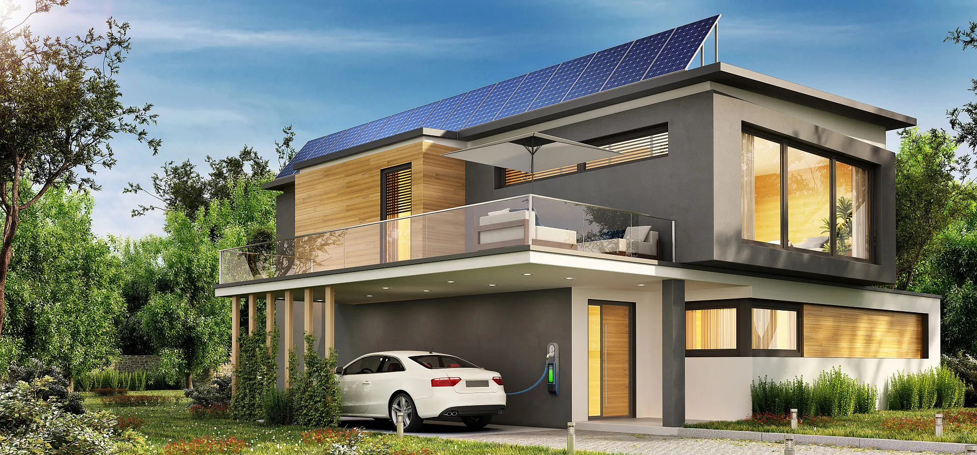 Ein modernes, zweistöckiges Haus mit Solarzellen auf dem Dach und einer Ladestation für Elektroautos.